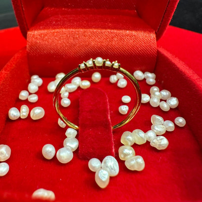 Peral rings1.24gram 21k   